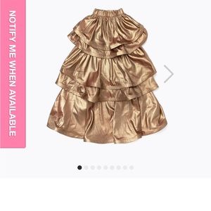 Buru Teagan gold skirt. Size medium. New with tags.